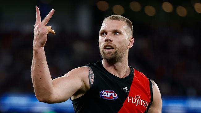 MELBOURNE, AUSTRALIA - JUNE 09: Jake Stringer of the Bombers celebrates a goal during the 2024 AFL Round 13 match between the Essendon Bombers and the Carlton Blues at The Melbourne Cricket Ground on June 09, 2024 in Melbourne, Australia. (Photo by Michael Willson/AFL Photos via Getty Images)