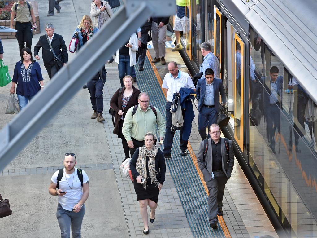 Commuters arrive at Gosford Railway Station. Picture: AAP IMAGE / Troy Snook