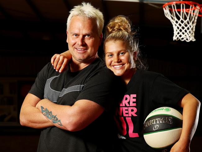 WEEKEND TELEGRAPHS SPECIAL. MUST TALK WITH PIC ED JEFF DARMANIN BEFORE PUBLISHING - Shyla Heal, daughter of Boomers basketball legend Shane Heal pictured with her dad at Sutherland Basketball Stadium before moving to North Queensland where she has been signed to the Townsville Fire for the upcoming WNBL season. Picture: Toby Zerna