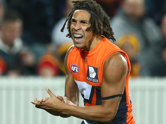 CANBERRA, AUSTRALIA - AUGUST 11:  Aiden Bonar of the Giants celebrates a goal during the round 21 AFL match between the Greater Western Giants and the Adelaide Crows at UNSW Canberra Oval on August 11, 2018 in Canberra, Australia.  (Photo by Mark Nolan/Getty Images)