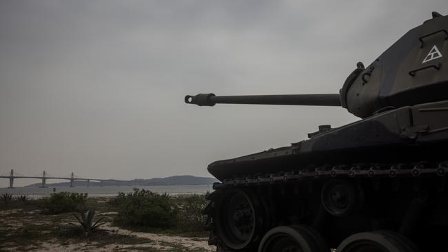 Tanks used by the Taiwan military are seen on display for tourists at a beach in Kinmen, Taiwan.