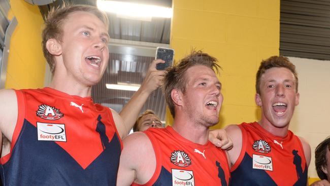 Sam Gibson (centre) belts out the song after Montrose’s win over East Ringwood. Picture: Chris Eastman/AAP