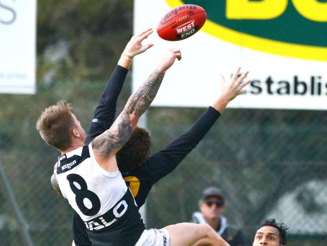 SANFL: Glenelg v Port Adelaide at Glenelg Oval, Sunday, May 26, 2019. Port Adelaide's Hamish Hartlett spoils Lachlan Hosie. (Pic: AAP/Brenton Edwards)