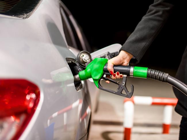 Generic photo - Petrol pump. woman pumping petrol in car at petrol station. Picture: iStock