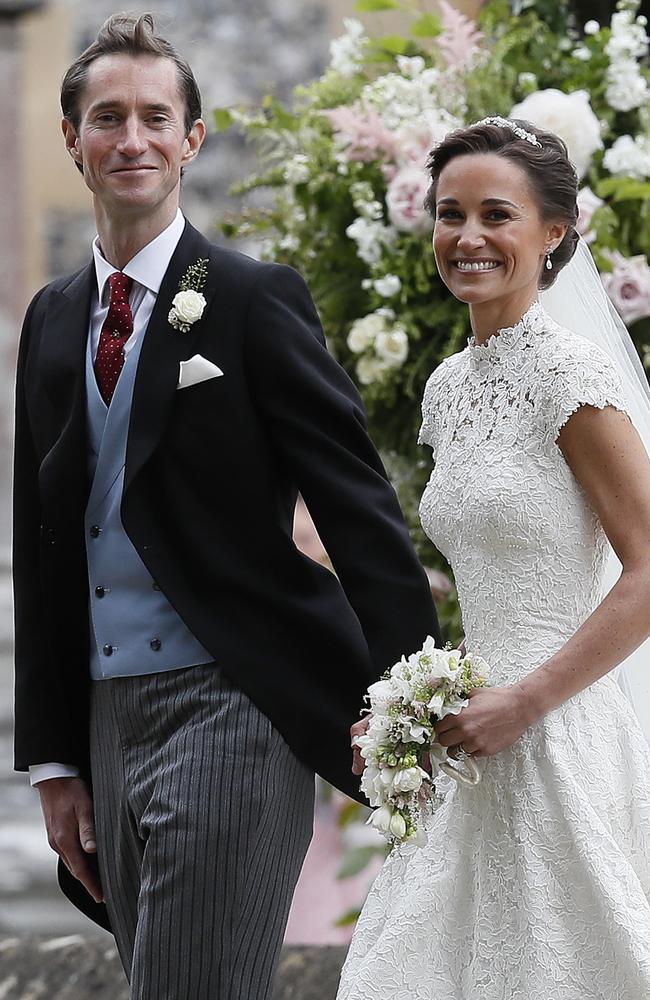 Pippa Middleton and James Matthews beam as they leave St Mark's Church.