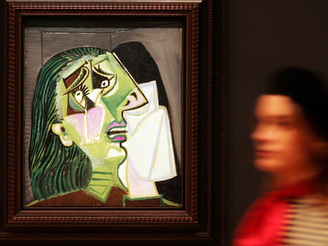 Picasso’s Weeping Woman hanging in the National Gallery of Victoria. The painting was stolen and held to ransom in 1986. Picture: HWT Library.