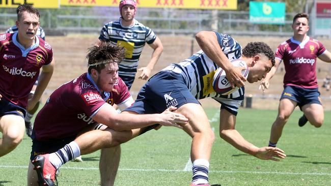 Rugby Union. University versus Brothers at Ballymore Stadium. Photo of Athen tackled by Sam Kelly-Knowles. 17 October 2020 Herston Picture by Richard Gosling