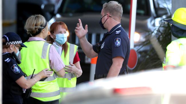 People getting tested at Sullivan Nicolaides drive through Covid testing centre at Bowen Hills on Sunday, August 1, 2021. Photo Steve Pohlner