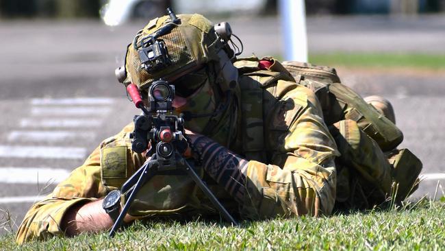 An Australian Army soldier on patrol near Ingham State High School during the North Queensland Warfighter Exercise in Hinchinbrook, North Queensland. Picture: Cameron Bates