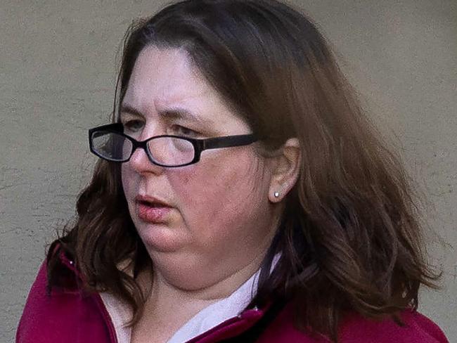 Flowers have been left at the front of her home. Erin Patterson arriving at her Leongatha home after three people died eating Death Cap mushrooms from a meal she had cooked. Picture: Jason Edwards