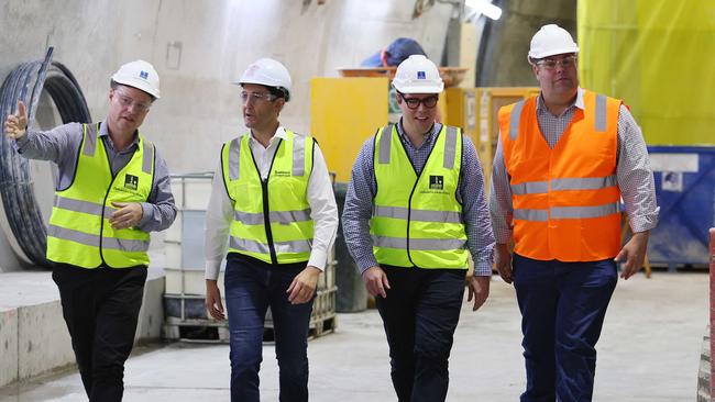 (L-R) Lord Mayor Adrian Schrinner, Premier David Crisafulli, Ryan Murphy and Transport Minister Brent Mickelberg inspect the tunnel in December.