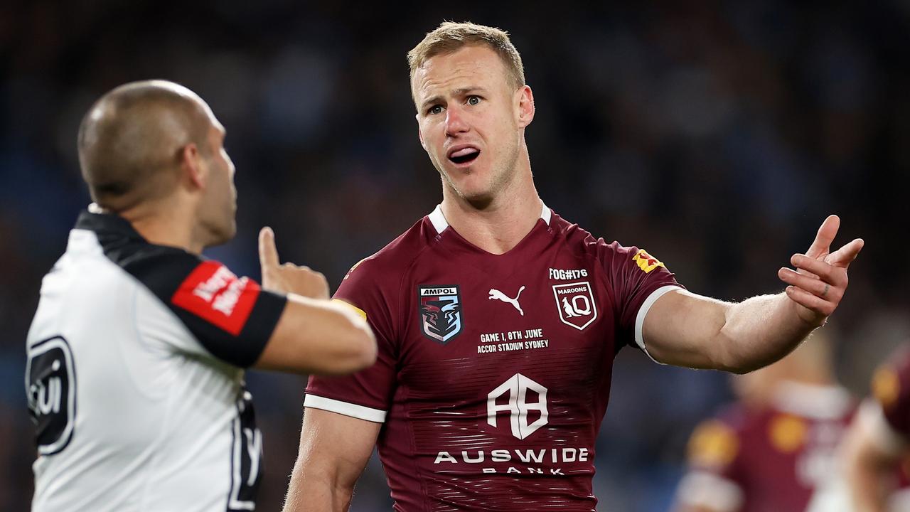 Maroons captain Daly Cherry-Evans speaks to referee Ashley Klein after a dangerous tackle on Cameron Munster in Game One. Picture: Mark Kolbe/Getty Images