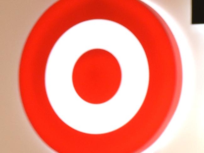 A shopper leaves a Target store in Sydney on Thursday, Oct. 22, 2015. Wesfarmers total sales for the quarter were up 11.6 per cent to $2.5 billion compared to the same period last year. (AAP Image/Paul Miller) NO ARCHIVING