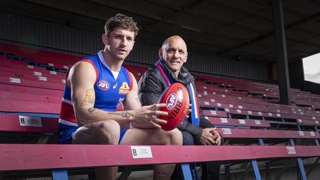 Tony Liberatore, with son Tom at Whitten Oval, is proud that the Bulldogs survived. Picture: AAP