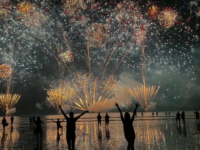 Lily North and Katrina Leembruggen enjoy the Fireworks at Mindil Beach Picture: Supplied Territory Day 2019 Fireworks Gallery