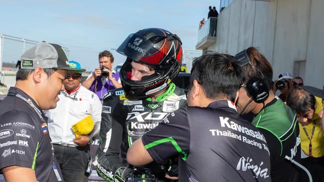 Bryan Staring is congratulated by his Thailand crew after victory in the Asia Road Racing Championship. Picture: ANDREW GOSLING