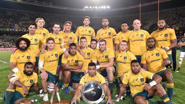 The Wallabies pose with the Nelson Mandela Challenge Plate in Bloemfontein.