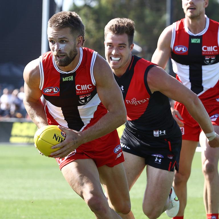 Dan Butler evades Zach Merrett during St Kilda’s practice match win. Picture: Michael Klein