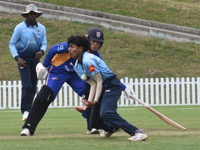 Leon Cooray wears one on the chest off his own bowling. Picture: Sean Teuma