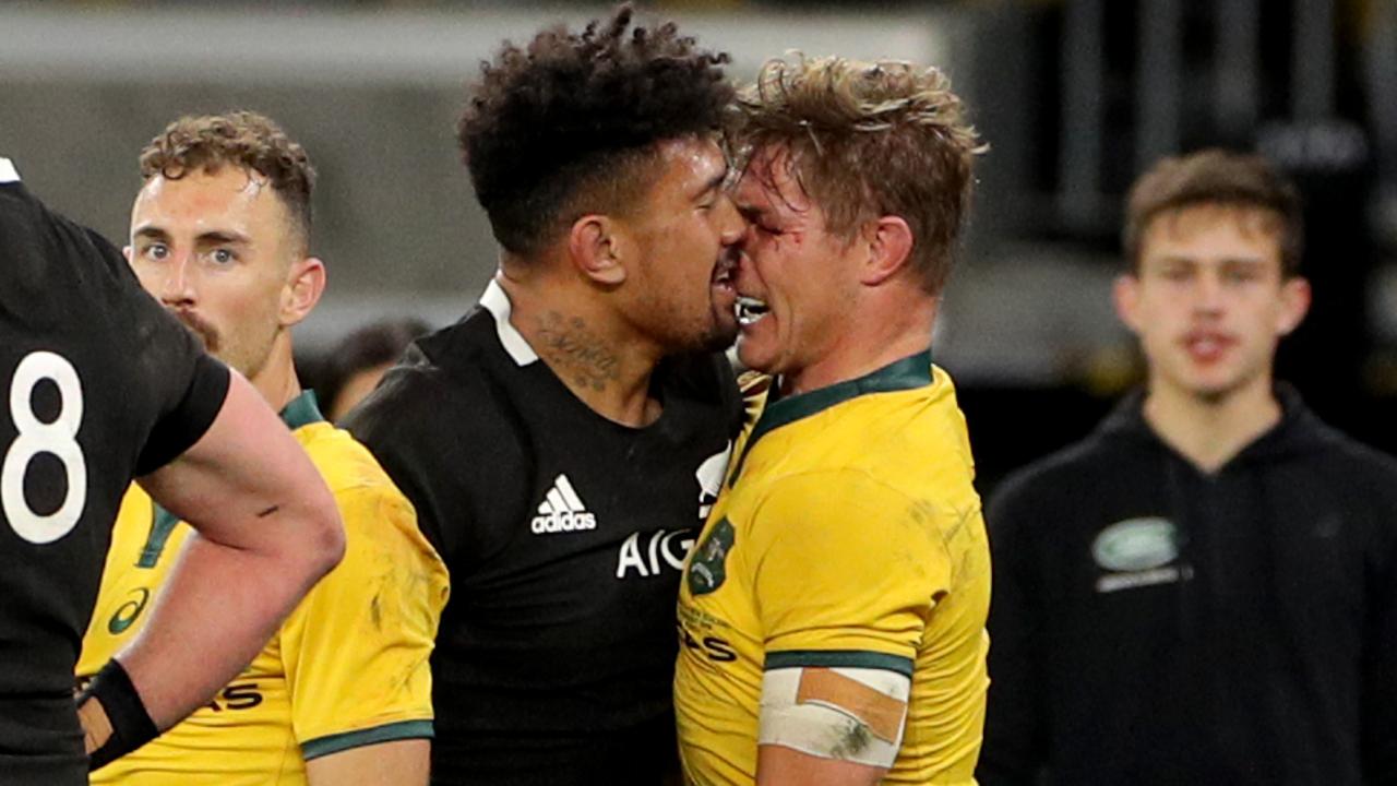 Michael Hooper of the Wallabies and Ardie Savea of the All Blacks clash.