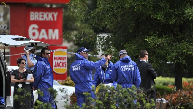 Forensic services arrive at the West Hoxton Hungry Jack’s after the shooting. Picture: Robert Pozo