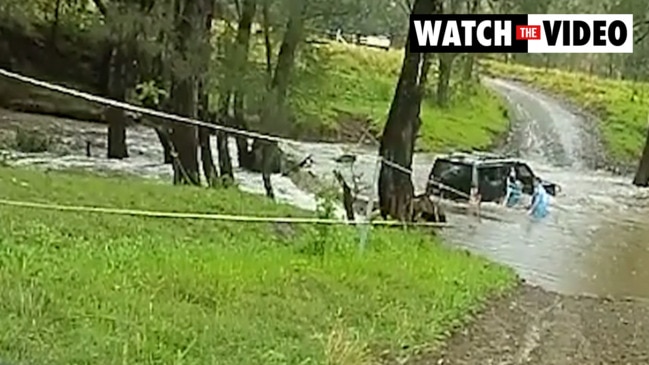 Police officer rescues three in flood waters