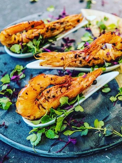 Dee Ibrahim-Milligan’s peri peri grilled prawns with smoked harissa.