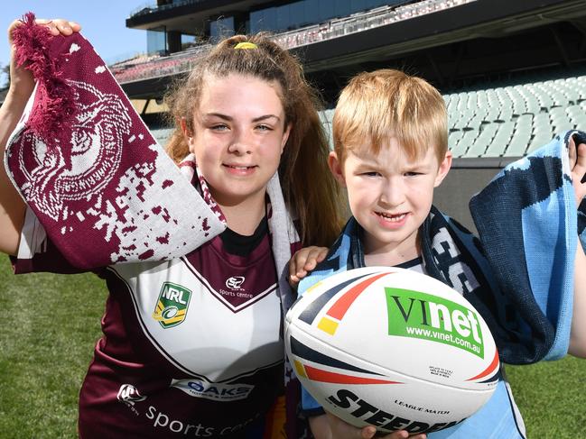 Emily Meyrick - 12yrs and Jacob Holding - 7yrs pose for a photograph Adelaide Oval, Adelaide on Wednesday the 14th of February 2018. The NRL State of Origin will come to Adelaide Oval in 2020 for the first time. (AAP/ Keryn Stevens)