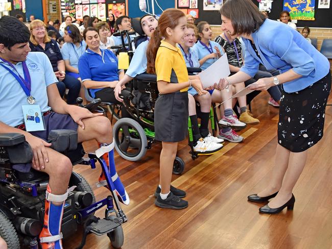 NSW Premier Gladys Berejiklian congratulates Hilltop Road Public School Yr 4 student Yasmin Nawabi at Holroyd School at Merrylands. Picture: AAP IMAGE / Troy Snook