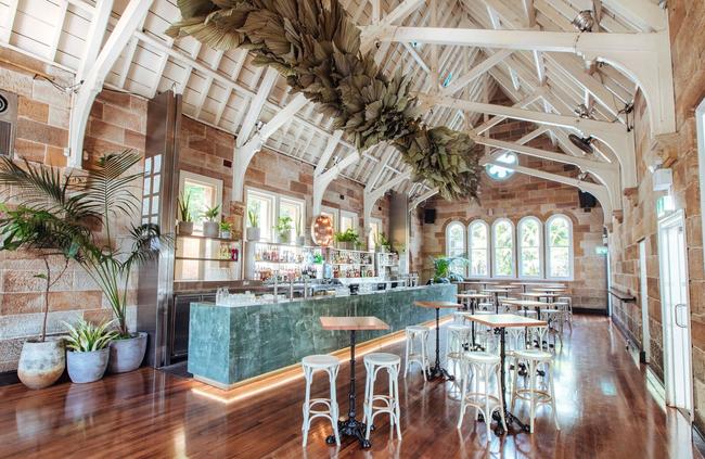 The chapel bar has soaring timber-trussed ceilings, arched glasswork and striking classical features. Photographer: Alana Dimou