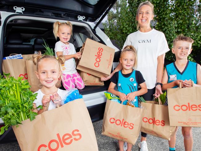 EMBARGO: May 10 Coles paper bags. Coles are discontinuing plastic bags and will be offering paper bags. Poppy (orange shorts), 6, Stella (smallest girl), 4, Maisie (netball uniform), 8,  Jobe (boy), 9, and mum Hayley Ward at their home in Lysterfield, Melbourne. Picture: Rebecca Michael