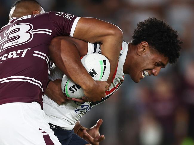 GOSFORD, AUSTRALIA - FEBRUARY 17: Siua Wong of the Roosters is tackled during the NRL Trial Match between the Sydney Roosters and the Manly Sea Eagles at Central Coast Stadium on February 17, 2023 in Gosford, Australia. (Photo by Matt King/Getty Images)