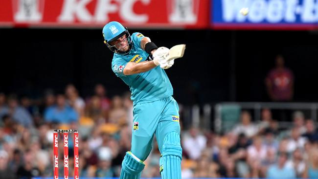 Heat debutant James Bazley hits a ball for six against the Hurricanes. Picture: Bradley Kanaris/Getty Images