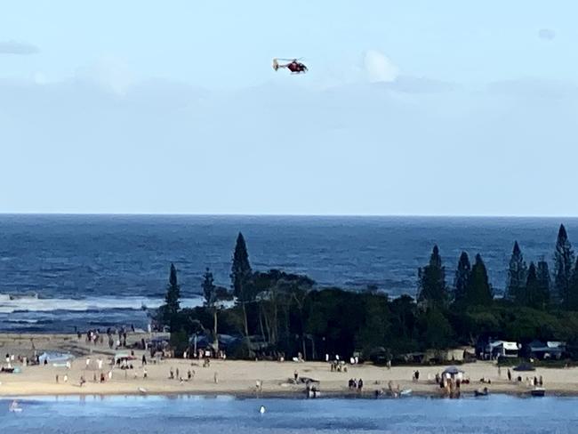 Westpac Lifesaver Helicopter flying over a Sunshine Coast beach searching for a missing person Picture Dan Peled