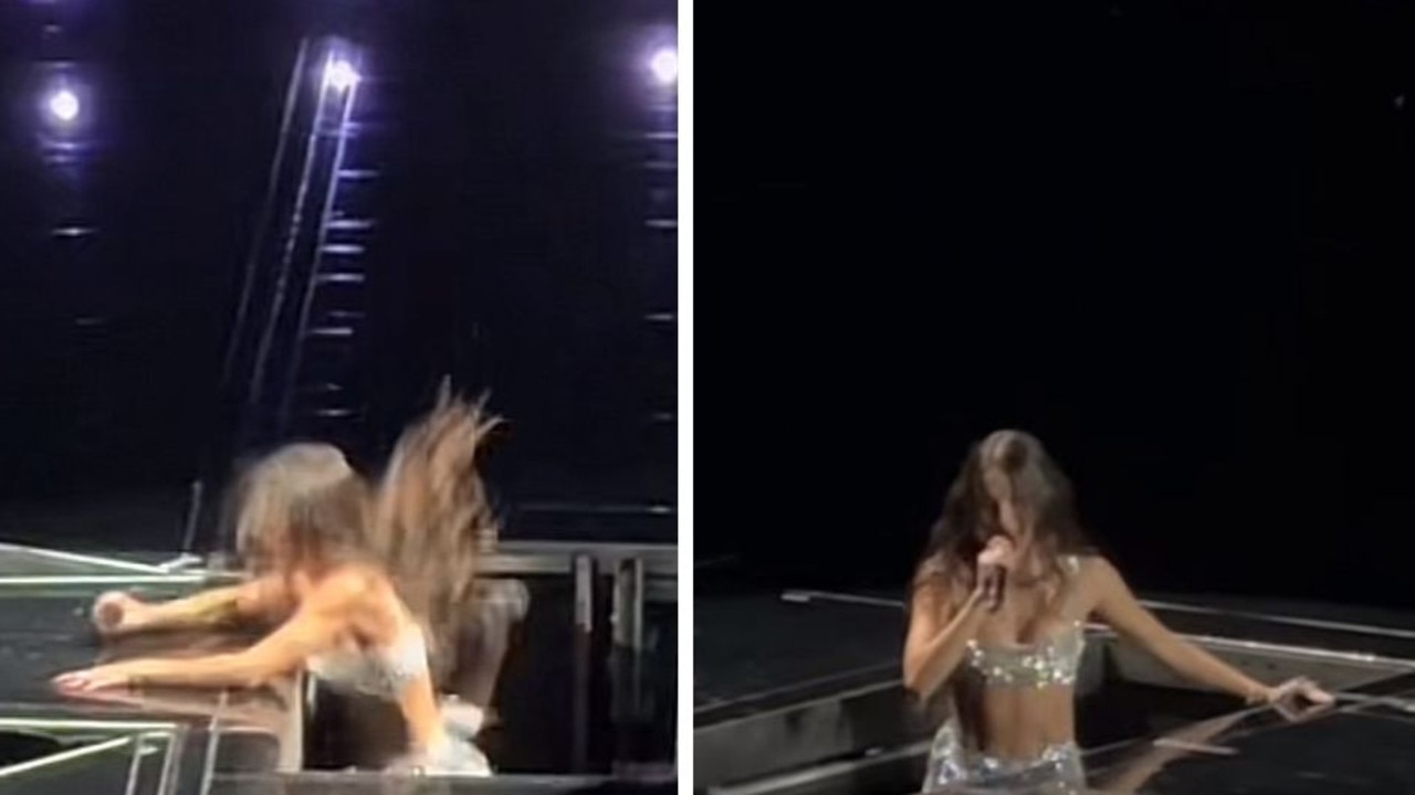 Moment singer falls through stage at Aussie show