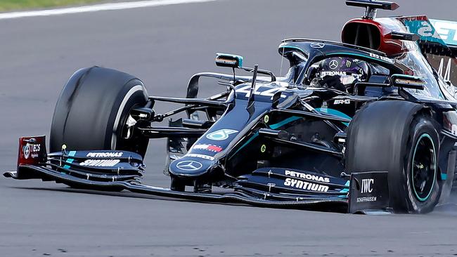 The punctured tyre of Mercedes' British driver Lewis Hamilton punctures is pictured as he goes on to win the Formula One British Grand Prix