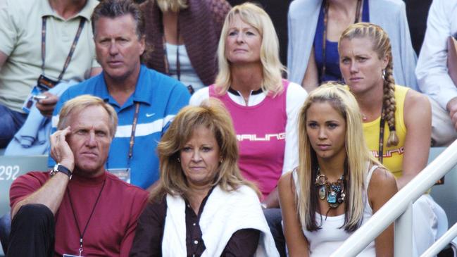 Australian golf legend Greg Norman, his wife Laura, then-girlfriend Bec Cartwright (now wife, Bec Hewitt) and Hewitt’s parents Glynn (top-left) and Cherilyn (in pink) before the start of the 2005 Australian Open final.