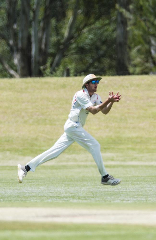 George Casey takes a catch for Highfields. Picture: Kevin Farmer