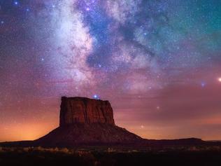 Monument Stars © Albert Dros Despite being taken during the Lunar Eclipse of 2015 the photographer actually didn't shoot the moon, but took the opportunity to capture the amazing dark sky that presented itself. Coming from a country (the Netherlands) with so much light pollution, this marked the first time the photographer had seen the Milky Way so clearly. The red glow in the sky is from the extraordinary atmosphere during the Lunar Eclipse, and the photographer remarked that it was, ‘An experience I will never forget.’ This shot is a panorama comprised of 3 vertical shots. Monument Valley, United States