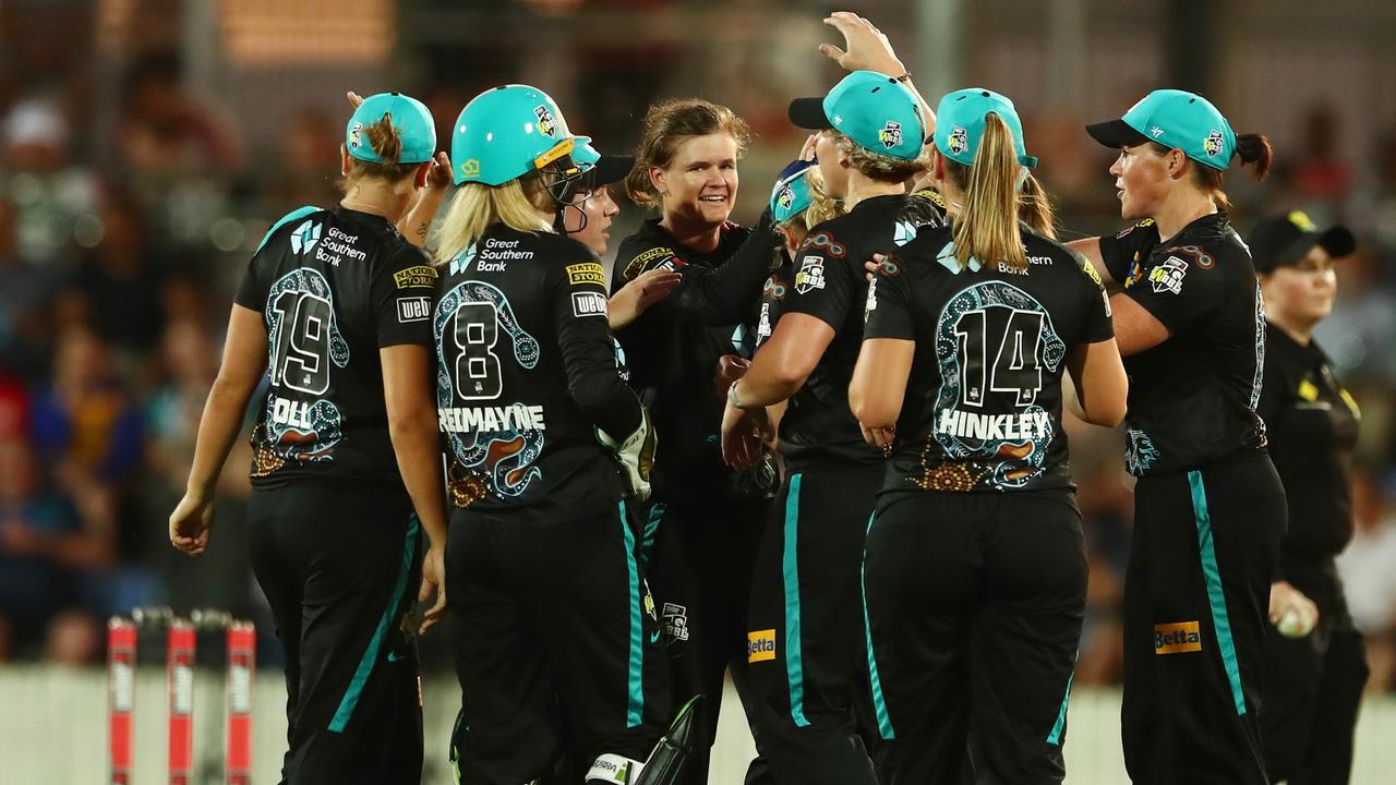 MACKAY, AUSTRALIA - NOVEMBER 13: Jess Jonassen of the Heat celebrates dismissing Ellyse Perry of the Sixers during the Women's Big Bash League match between the Brisbane Heat and the Sydney Sixers at Great Barrier Reef Arena, on November 13, 2021, in Mackay, Australia. (Photo by Chris Hyde/Getty Images)