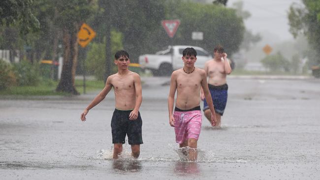 Police are door knocking homes in Railway Estate Townsville as flood waters start to rise. Pics Adam Head