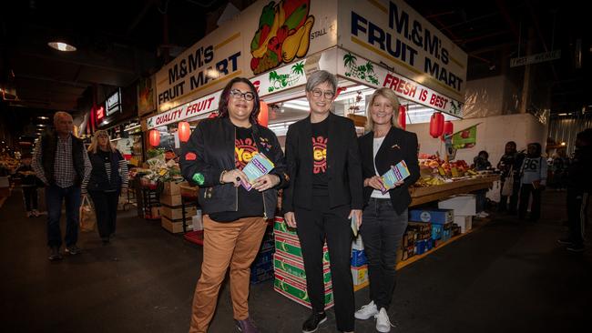 Senator Penny Wong, Former Senator Natasha Stott Despoja and Indigenous affairs spokes-person Khatija Thomas hand out how to vote Ã&#148;YesÃ&#149; information for the upcoming Referendum on an Aboriginal Voice to Parliament to be written into the Australian Constitution at Adelaide’s Central Markets, SA. Picture: NCA NewsWIRE / Emma Brasier