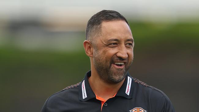 SYDNEY, AUSTRALIA - MARCH 07: Wests Tigers head coach Benji Marshall smiles before the round one NRL match between Wests Tigers and Newcastle Knights at Campbelltown Sports Stadium, on March 07, 2025, in Sydney, Australia. (Photo by Mark Metcalfe/Getty Images)