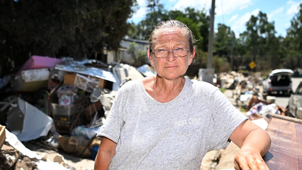 Flood victim Lauraine Ormond outside her flood-damaged home in Goodna, west of Brisbane. Picture: NCA NewsWire / Dan Peled