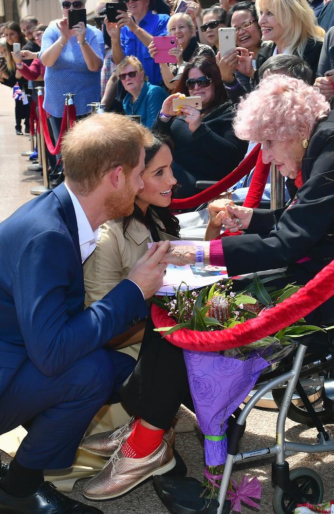 The Duke and Duchess of Sussex greet war widow Daphne Dunne. Picture: Samir Hussein/WireImage