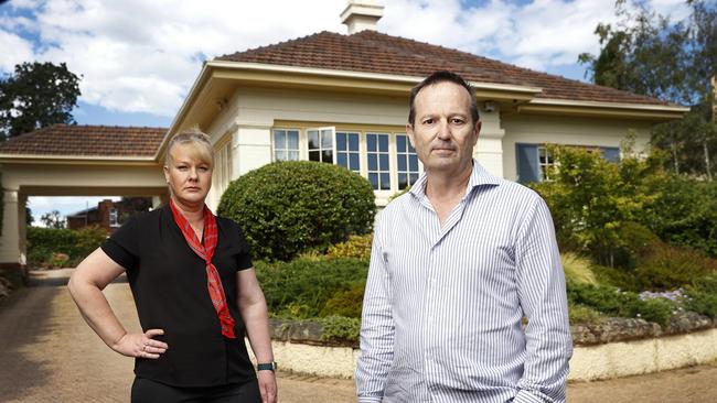 PRD real estate agent and property manager Jane Donoghue alongside owner of the Sandy Bay property Stephen Hannan. Picture: Zak Simmonds