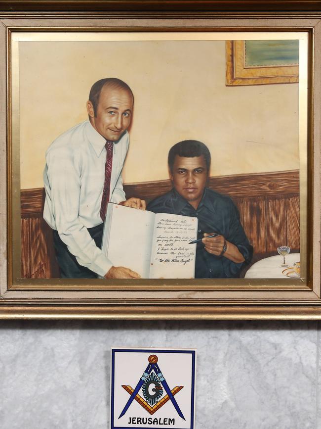 Painting of a photograph of Muhammad Ali with Marcello Marcobello. Picture: Richard Dobson