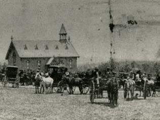 Mourners gather for the siblings' funeral. Picture courtesy of Queensland State Archives