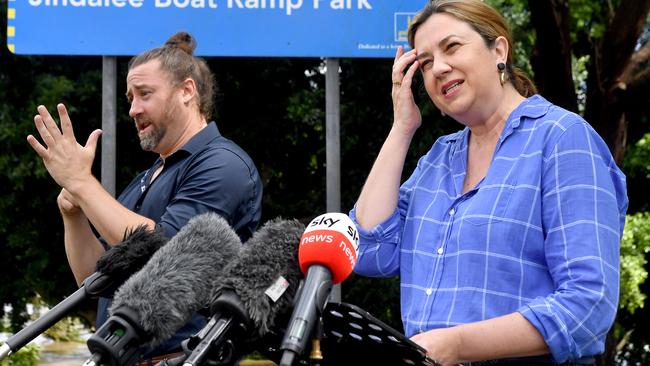 Auslan interpreter Mikey Webb (L) became a minor celebrity in Queensland for his appearances at Covid and emergency press conferences. Picture: NCA NewsWire / John Gass