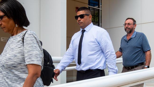 Former police officer Daniel Keelan, centre, faces the Northern Territory Supreme Court for sentencing submissions after pleading guilty to a series of charges.